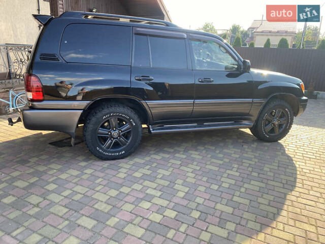Черный Лексус ЛХ, объемом двигателя 4.67 л и пробегом 365 тыс. км за 17500 $, фото 10 на Automoto.ua