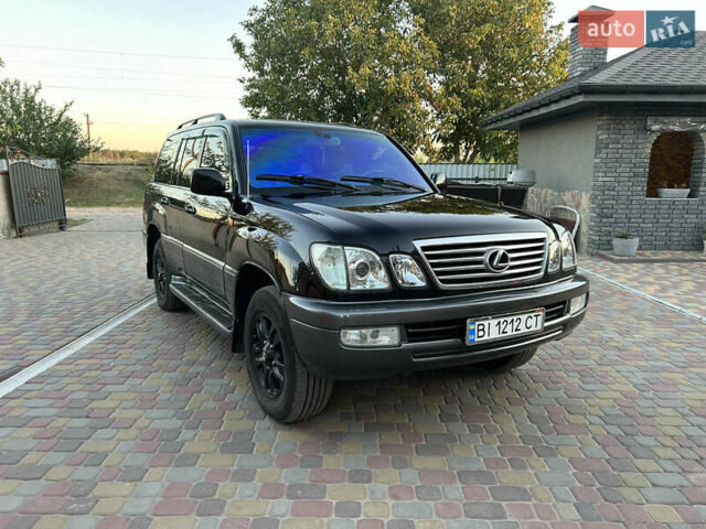 Чорний Лексус ЛХ, об'ємом двигуна 4.7 л та пробігом 270 тис. км за 14200 $, фото 2 на Automoto.ua