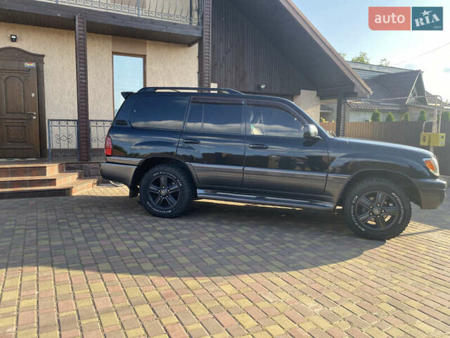 Черный Лексус ЛХ, объемом двигателя 4.67 л и пробегом 365 тыс. км за 17500 $, фото 4 на Automoto.ua