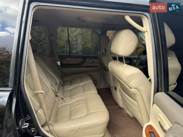 Черный Лексус ЛХ, объемом двигателя 4.66 л и пробегом 281 тыс. км за 14800 $, фото 11 на Automoto.ua