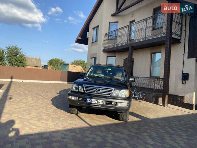 Черный Лексус ЛХ, объемом двигателя 4.67 л и пробегом 365 тыс. км за 17500 $, фото 3 на Automoto.ua
