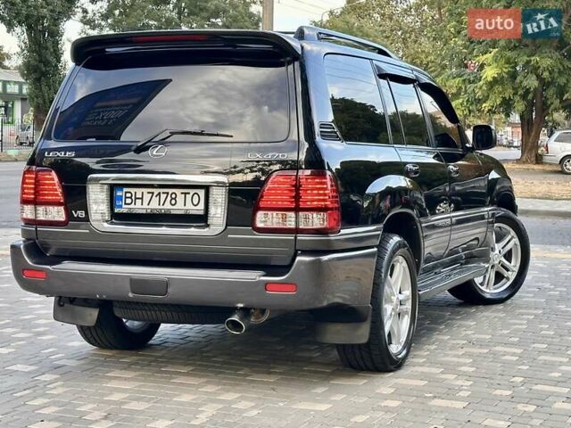 Черный Лексус ЛХ, объемом двигателя 4.7 л и пробегом 230 тыс. км за 14900 $, фото 18 на Automoto.ua