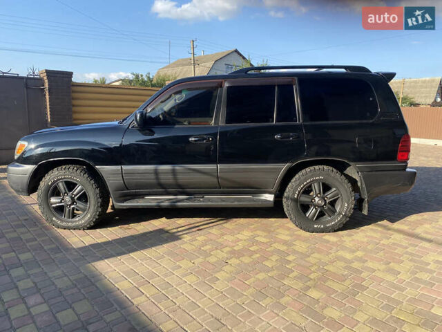 Черный Лексус ЛХ, объемом двигателя 4.67 л и пробегом 365 тыс. км за 17500 $, фото 6 на Automoto.ua