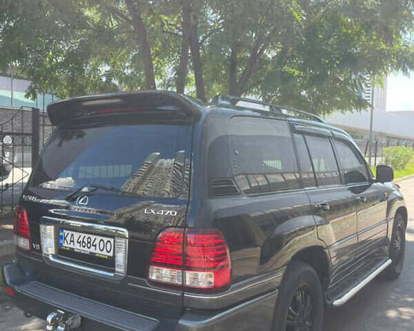 Чорний Лексус ЛХ, об'ємом двигуна 4.66 л та пробігом 250 тис. км за 18000 $, фото 2 на Automoto.ua