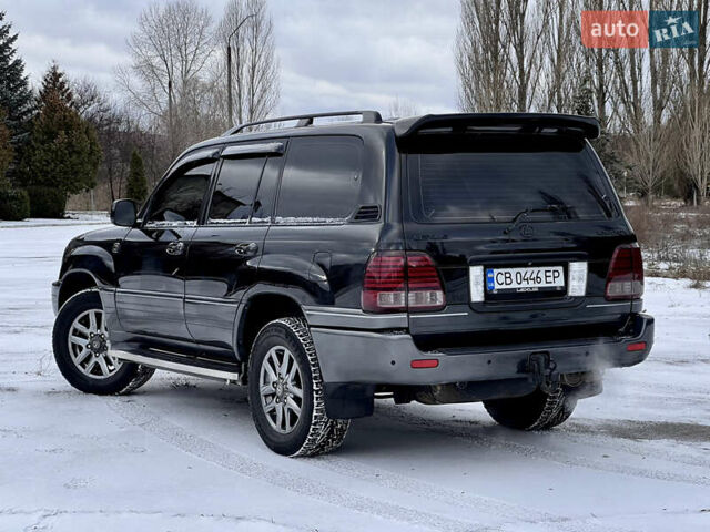 Черный Лексус ЛХ, объемом двигателя 4.7 л и пробегом 249 тыс. км за 14800 $, фото 2 на Automoto.ua