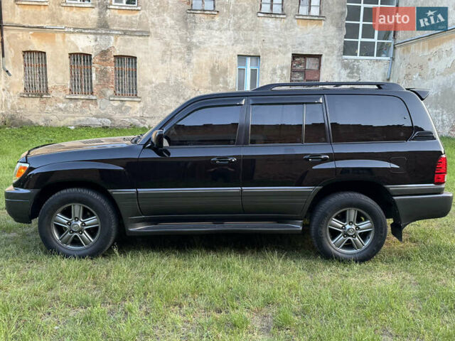 Черный Лексус ЛХ, объемом двигателя 4.7 л и пробегом 288 тыс. км за 15300 $, фото 1 на Automoto.ua
