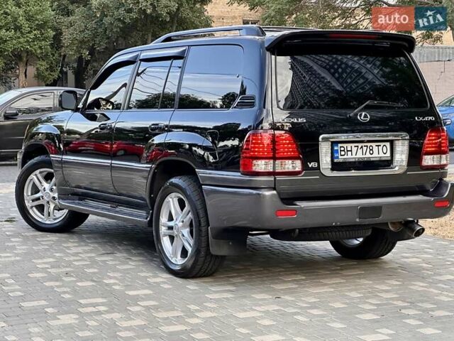 Черный Лексус ЛХ, объемом двигателя 4.7 л и пробегом 230 тыс. км за 14900 $, фото 23 на Automoto.ua