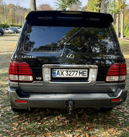 Черный Лексус ЛХ, объемом двигателя 4.7 л и пробегом 350 тыс. км за 12200 $, фото 3 на Automoto.ua