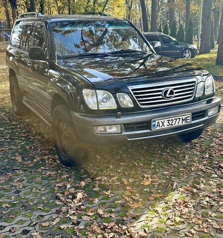 Черный Лексус ЛХ, объемом двигателя 4.7 л и пробегом 350 тыс. км за 12200 $, фото 5 на Automoto.ua