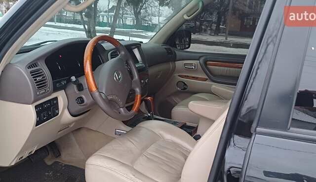 Черный Лексус ЛХ, объемом двигателя 4.67 л и пробегом 222 тыс. км за 15500 $, фото 5 на Automoto.ua