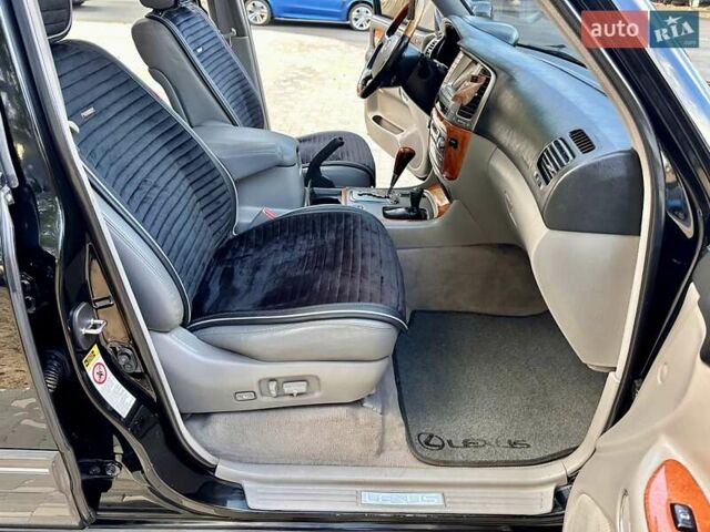 Черный Лексус ЛХ, объемом двигателя 4.7 л и пробегом 230 тыс. км за 14900 $, фото 44 на Automoto.ua