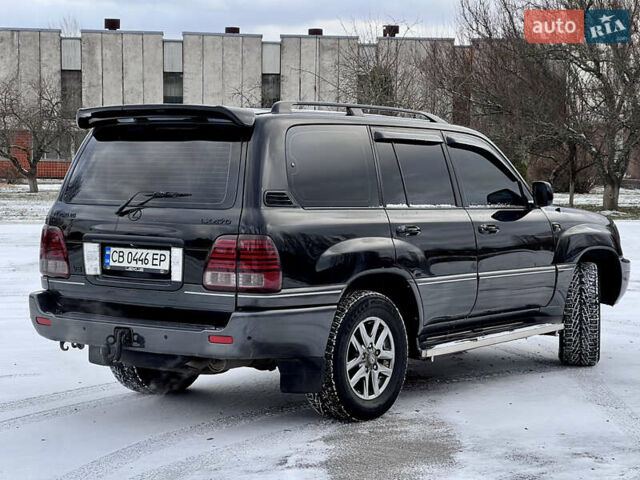 Черный Лексус ЛХ, объемом двигателя 4.7 л и пробегом 249 тыс. км за 14800 $, фото 3 на Automoto.ua