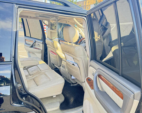 Черный Лексус ЛХ, объемом двигателя 4.7 л и пробегом 545 тыс. км за 15600 $, фото 6 на Automoto.ua