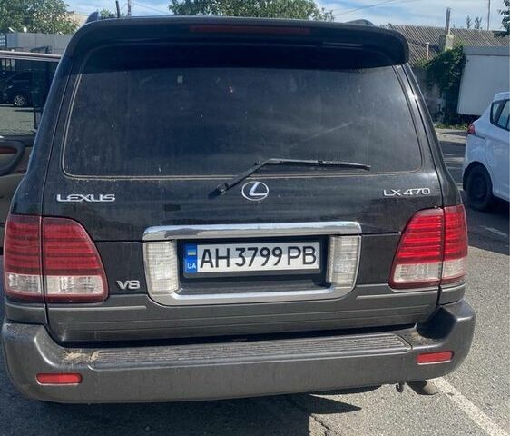 Черный Лексус ЛХ, объемом двигателя 4.7 л и пробегом 230 тыс. км за 10700 $, фото 1 на Automoto.ua