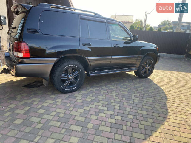 Черный Лексус ЛХ, объемом двигателя 4.67 л и пробегом 365 тыс. км за 17500 $, фото 11 на Automoto.ua