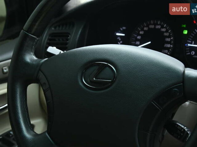 Черный Лексус ЛХ, объемом двигателя 4.66 л и пробегом 258 тыс. км за 16500 $, фото 25 на Automoto.ua