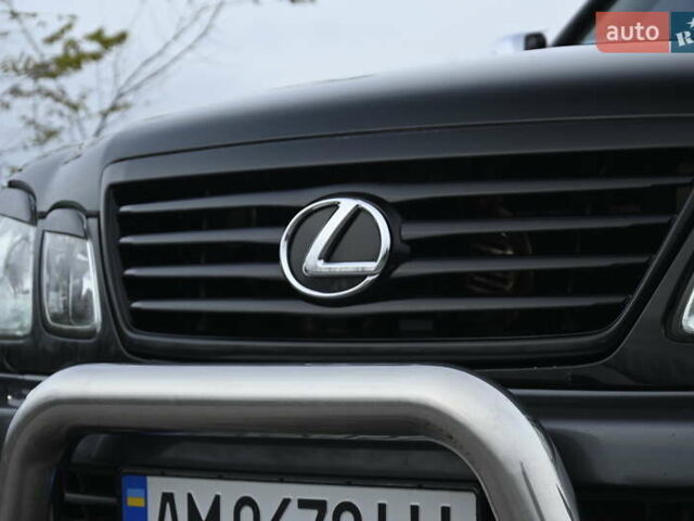 Черный Лексус ЛХ, объемом двигателя 4.66 л и пробегом 258 тыс. км за 16500 $, фото 7 на Automoto.ua