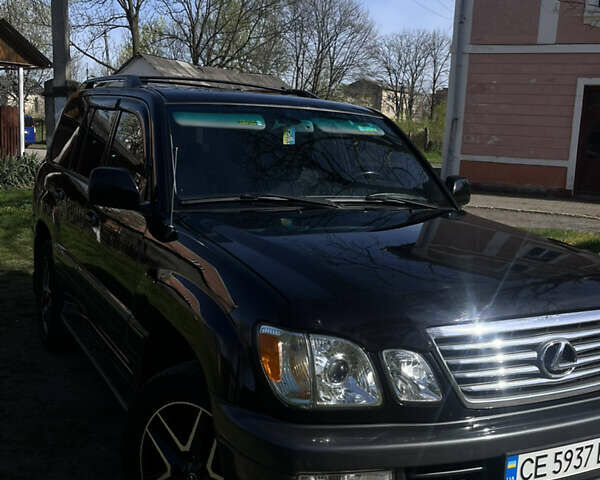 Черный Лексус ЛХ, объемом двигателя 4.67 л и пробегом 250 тыс. км за 18000 $, фото 3 на Automoto.ua