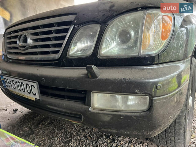 Чорний Лексус ЛХ, об'ємом двигуна 4.7 л та пробігом 270 тис. км за 14800 $, фото 1 на Automoto.ua