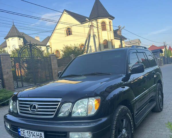 Черный Лексус ЛХ, объемом двигателя 4.67 л и пробегом 239 тыс. км за 17800 $, фото 1 на Automoto.ua