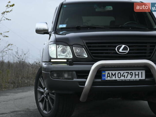 Черный Лексус ЛХ, объемом двигателя 4.66 л и пробегом 258 тыс. км за 16500 $, фото 3 на Automoto.ua