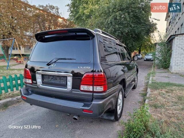 Черный Лексус ЛХ, объемом двигателя 4.66 л и пробегом 270 тыс. км за 17400 $, фото 11 на Automoto.ua