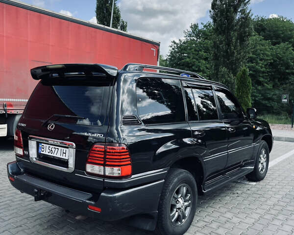 Чорний Лексус ЛХ, об'ємом двигуна 4.67 л та пробігом 225 тис. км за 15000 $, фото 4 на Automoto.ua