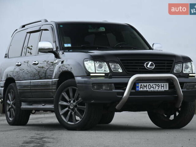 Черный Лексус ЛХ, объемом двигателя 4.66 л и пробегом 258 тыс. км за 16500 $, фото 1 на Automoto.ua