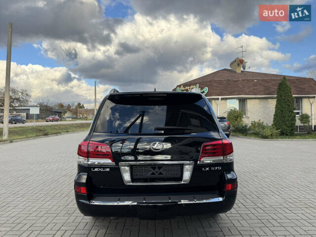 Чорний Лексус ЛХ, об'ємом двигуна 5.7 л та пробігом 233 тис. км за 21900 $, фото 5 на Automoto.ua