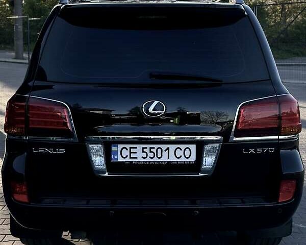 Черный Лексус ЛХ, объемом двигателя 5.66 л и пробегом 380 тыс. км за 26500 $, фото 2 на Automoto.ua