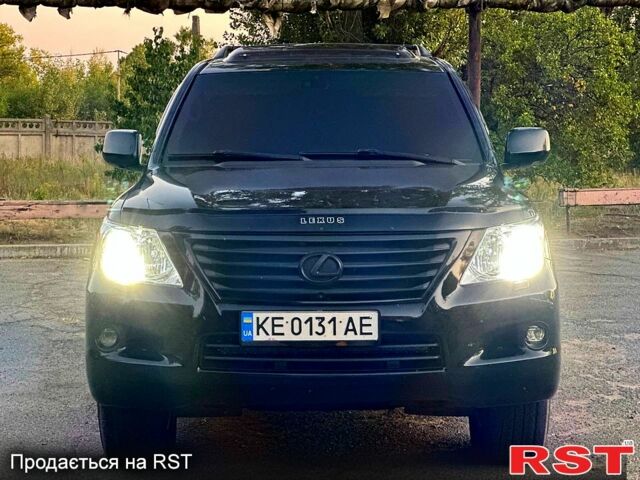 Черный Лексус ЛХ, объемом двигателя 5.7 л и пробегом 242 тыс. км за 20500 $, фото 1 на Automoto.ua