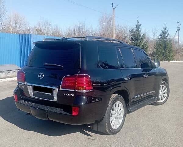 Черный Лексус ЛХ, объемом двигателя 5.66 л и пробегом 330 тыс. км за 18500 $, фото 3 на Automoto.ua