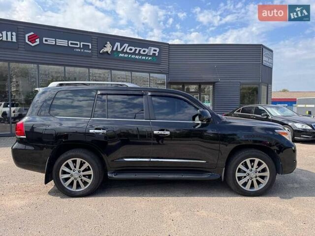 Черный Лексус ЛХ, объемом двигателя 5.66 л и пробегом 198 тыс. км за 27500 $, фото 16 на Automoto.ua