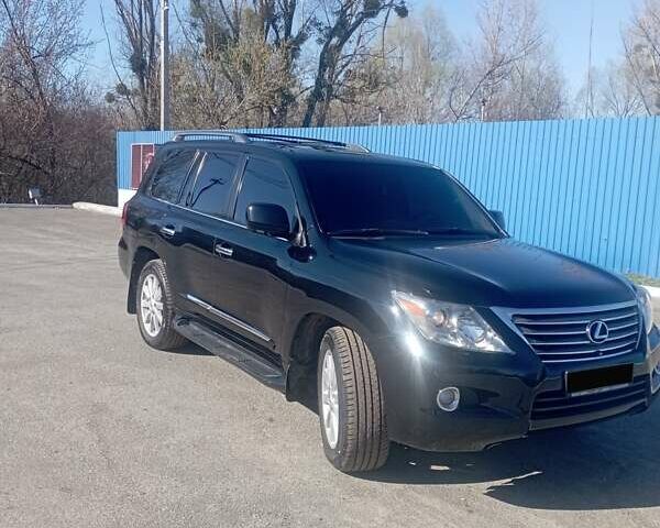 Черный Лексус ЛХ, объемом двигателя 5.66 л и пробегом 330 тыс. км за 18500 $, фото 5 на Automoto.ua