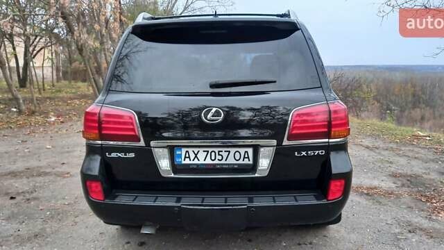 Черный Лексус ЛХ, объемом двигателя 5.66 л и пробегом 237 тыс. км за 31000 $, фото 2 на Automoto.ua