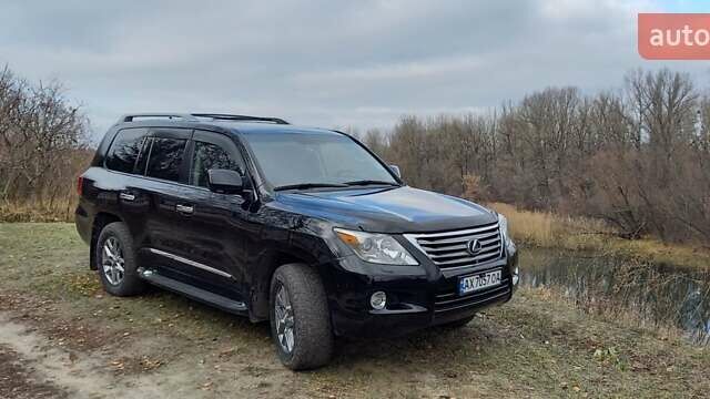 Черный Лексус ЛХ, объемом двигателя 5.66 л и пробегом 237 тыс. км за 31000 $, фото 3 на Automoto.ua