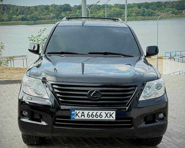 Черный Лексус ЛХ, объемом двигателя 5.7 л и пробегом 220 тыс. км за 27500 $, фото 1 на Automoto.ua