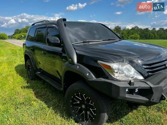 Черный Лексус ЛХ, объемом двигателя 5.66 л и пробегом 234 тыс. км за 34999 $, фото 1 на Automoto.ua