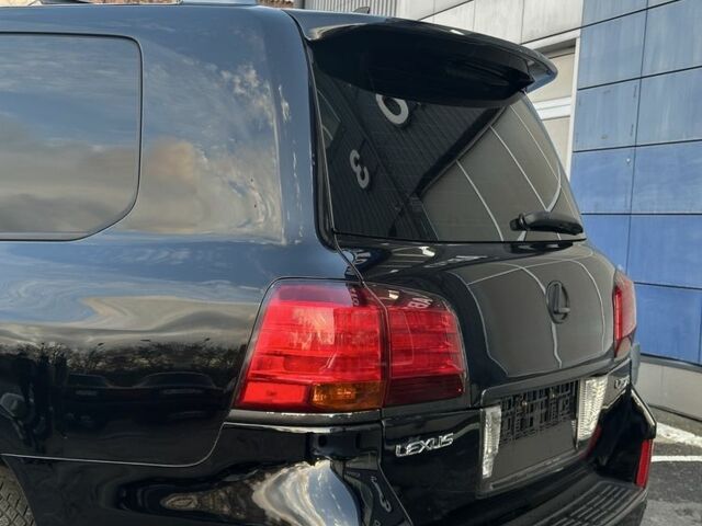 Черный Лексус ЛХ, объемом двигателя 5.7 л и пробегом 306 тыс. км за 21500 $, фото 6 на Automoto.ua