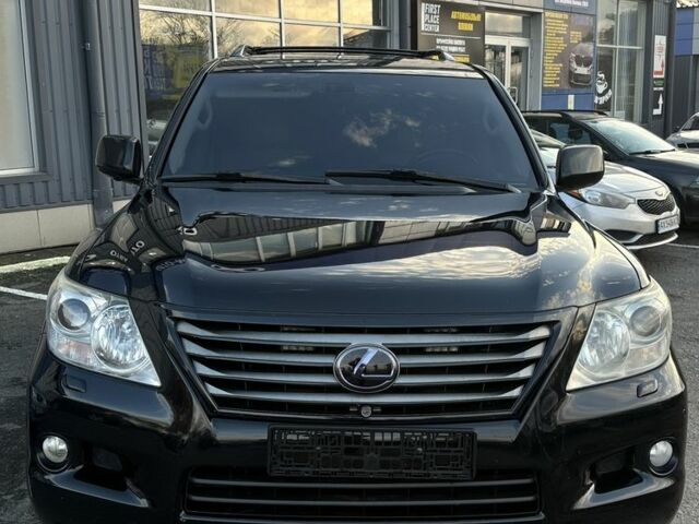 Черный Лексус ЛХ, объемом двигателя 5.7 л и пробегом 306 тыс. км за 21500 $, фото 1 на Automoto.ua