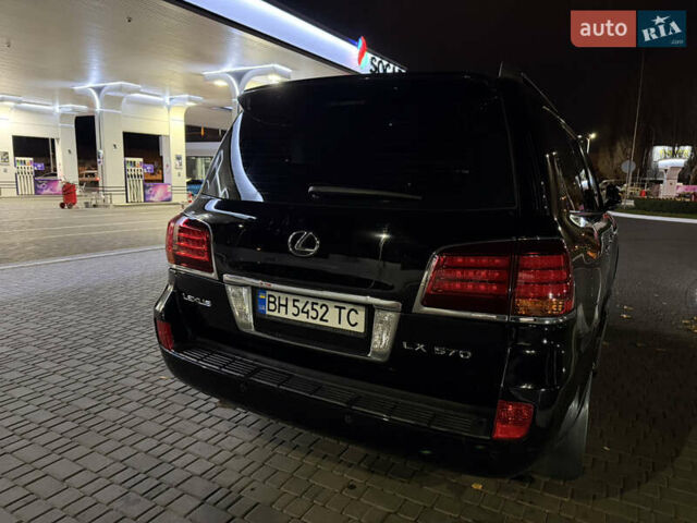 Черный Лексус ЛХ, объемом двигателя 5.7 л и пробегом 267 тыс. км за 23800 $, фото 6 на Automoto.ua
