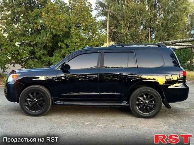 Черный Лексус ЛХ, объемом двигателя 5.7 л и пробегом 242 тыс. км за 20500 $, фото 3 на Automoto.ua