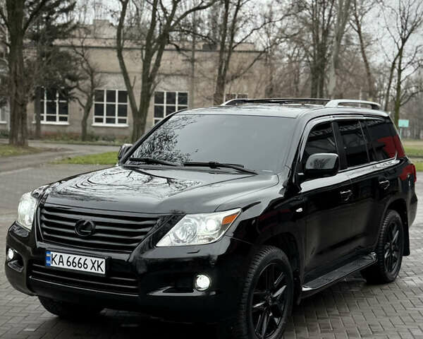 Черный Лексус ЛХ, объемом двигателя 5.7 л и пробегом 220 тыс. км за 28500 $, фото 1 на Automoto.ua