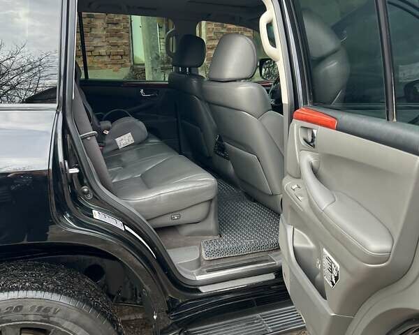 Черный Лексус ЛХ, объемом двигателя 5.66 л и пробегом 300 тыс. км за 24000 $, фото 5 на Automoto.ua