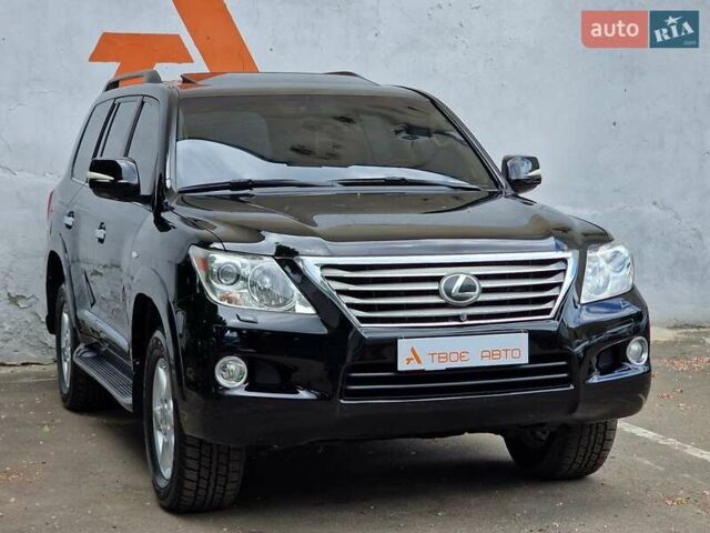 Черный Лексус ЛХ, объемом двигателя 5.66 л и пробегом 462 тыс. км за 21990 $, фото 4 на Automoto.ua