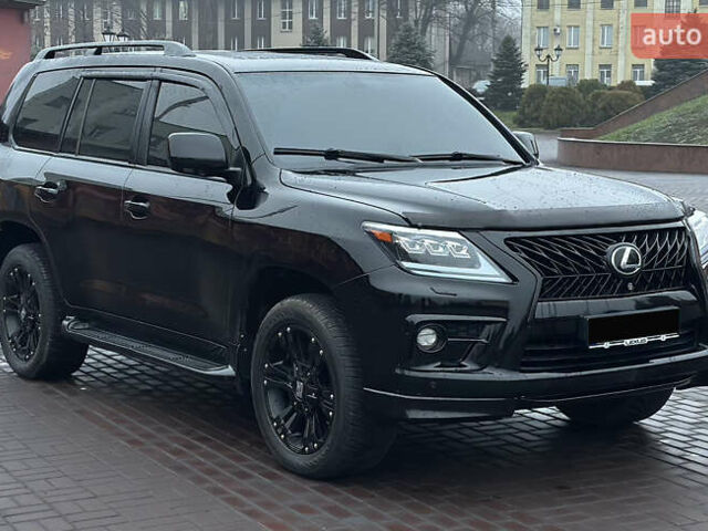 Черный Лексус ЛХ, объемом двигателя 5.66 л и пробегом 263 тыс. км за 19999 $, фото 4 на Automoto.ua