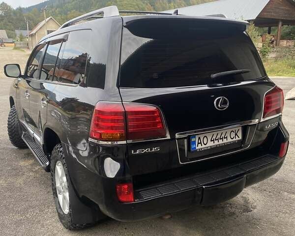 Чорний Лексус ЛХ, об'ємом двигуна 5.66 л та пробігом 186 тис. км за 27500 $, фото 1 на Automoto.ua