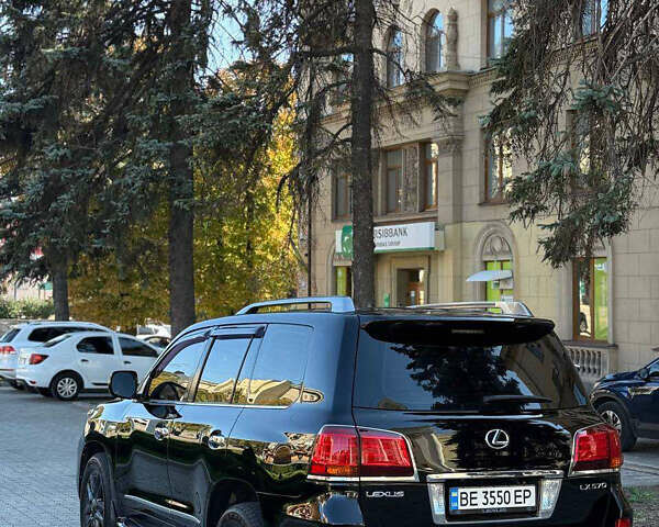 Черный Лексус ЛХ, объемом двигателя 5.66 л и пробегом 253 тыс. км за 26000 $, фото 3 на Automoto.ua