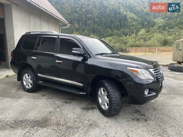 Черный Лексус ЛХ, объемом двигателя 5.66 л и пробегом 186 тыс. км за 33333 $, фото 4 на Automoto.ua