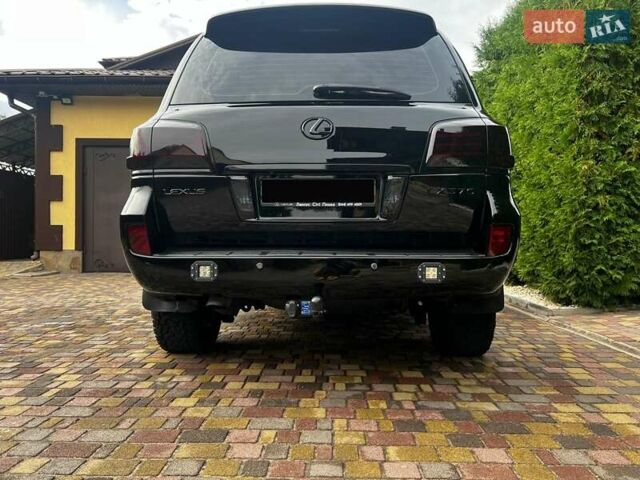 Черный Лексус ЛХ, объемом двигателя 5.66 л и пробегом 234 тыс. км за 34999 $, фото 10 на Automoto.ua